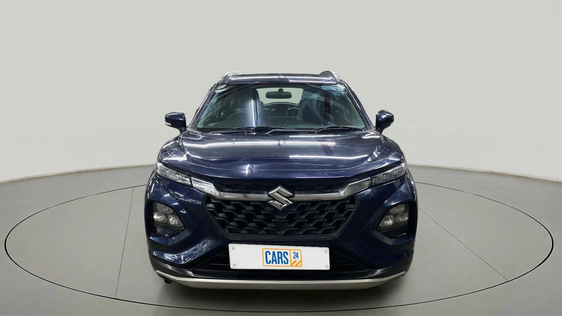 Front view of a Nexa Blue Maruti Suzuki FRONX