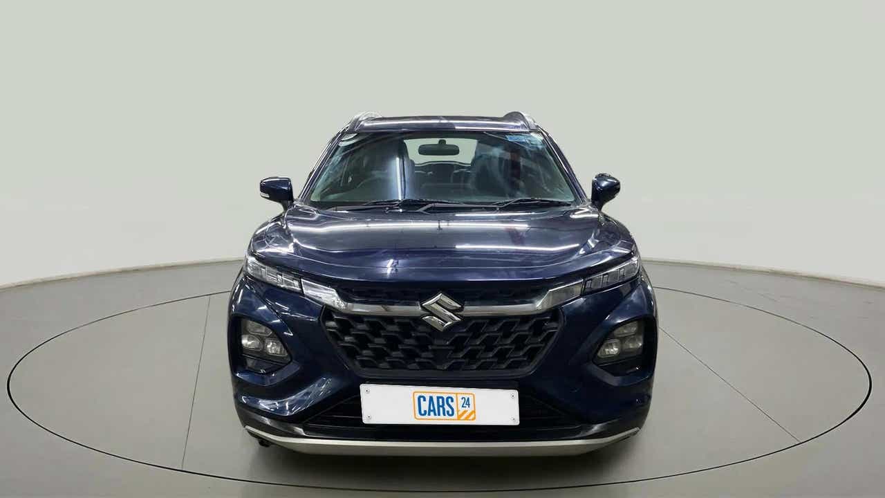 Front view of a Nexa Blue Maruti Suzuki FRONX