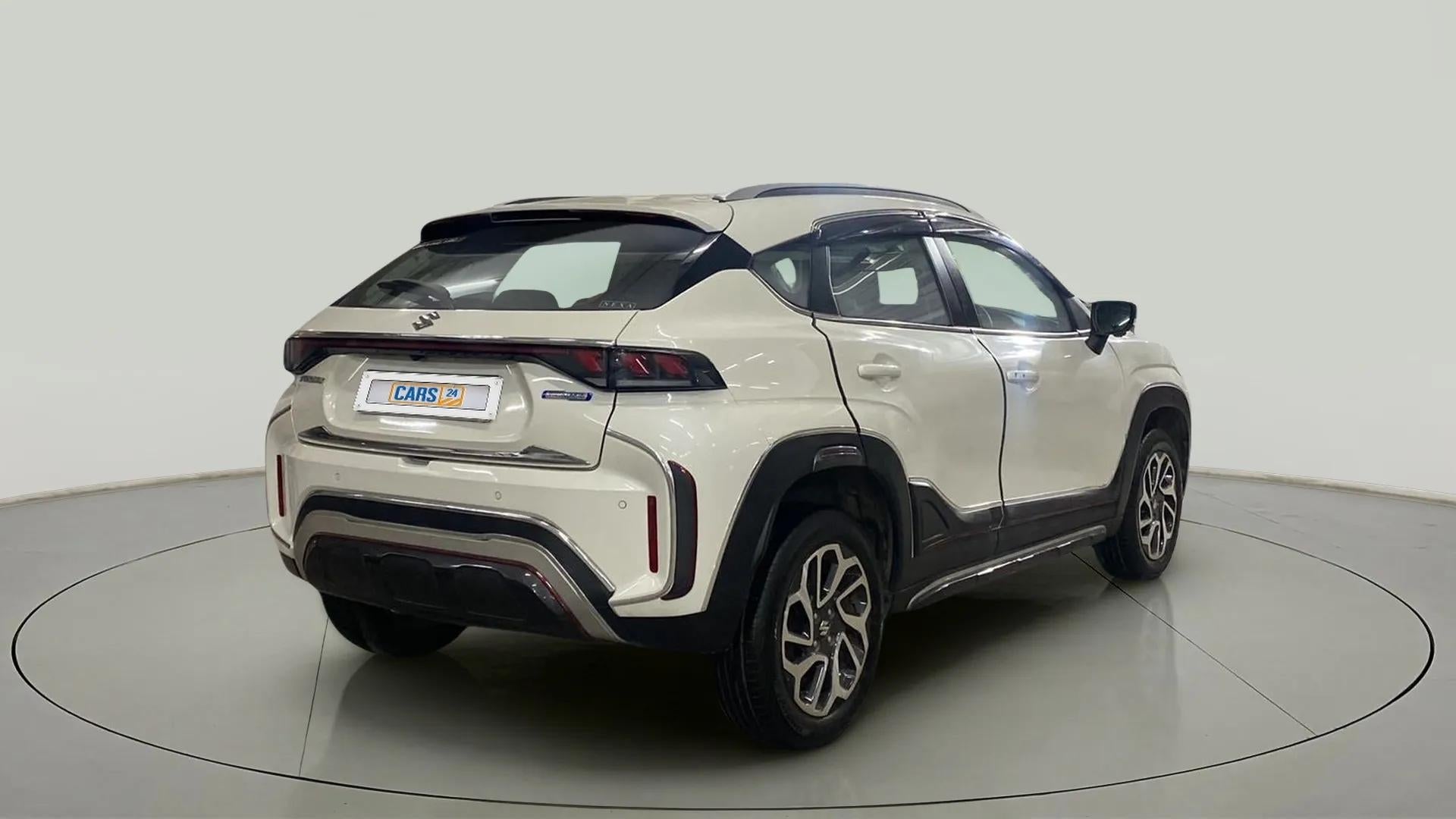 Rear three-quarter of a Maruti Suzuki FRONX