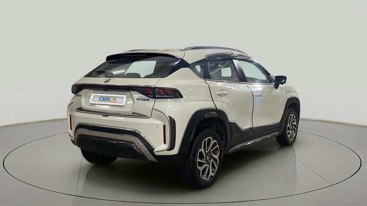Rear three-quarter of a Maruti Suzuki FRONX