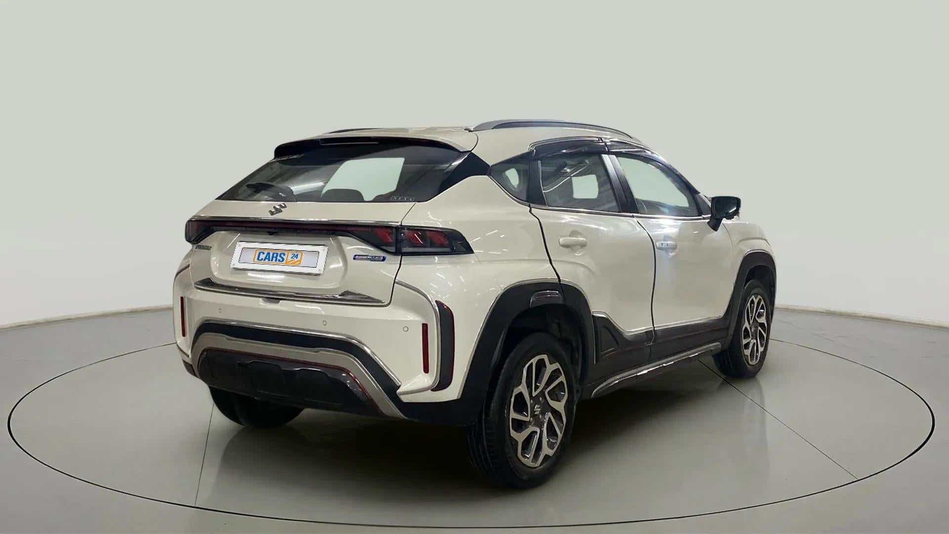 Rear three-quarter of a Maruti Suzuki FRONX