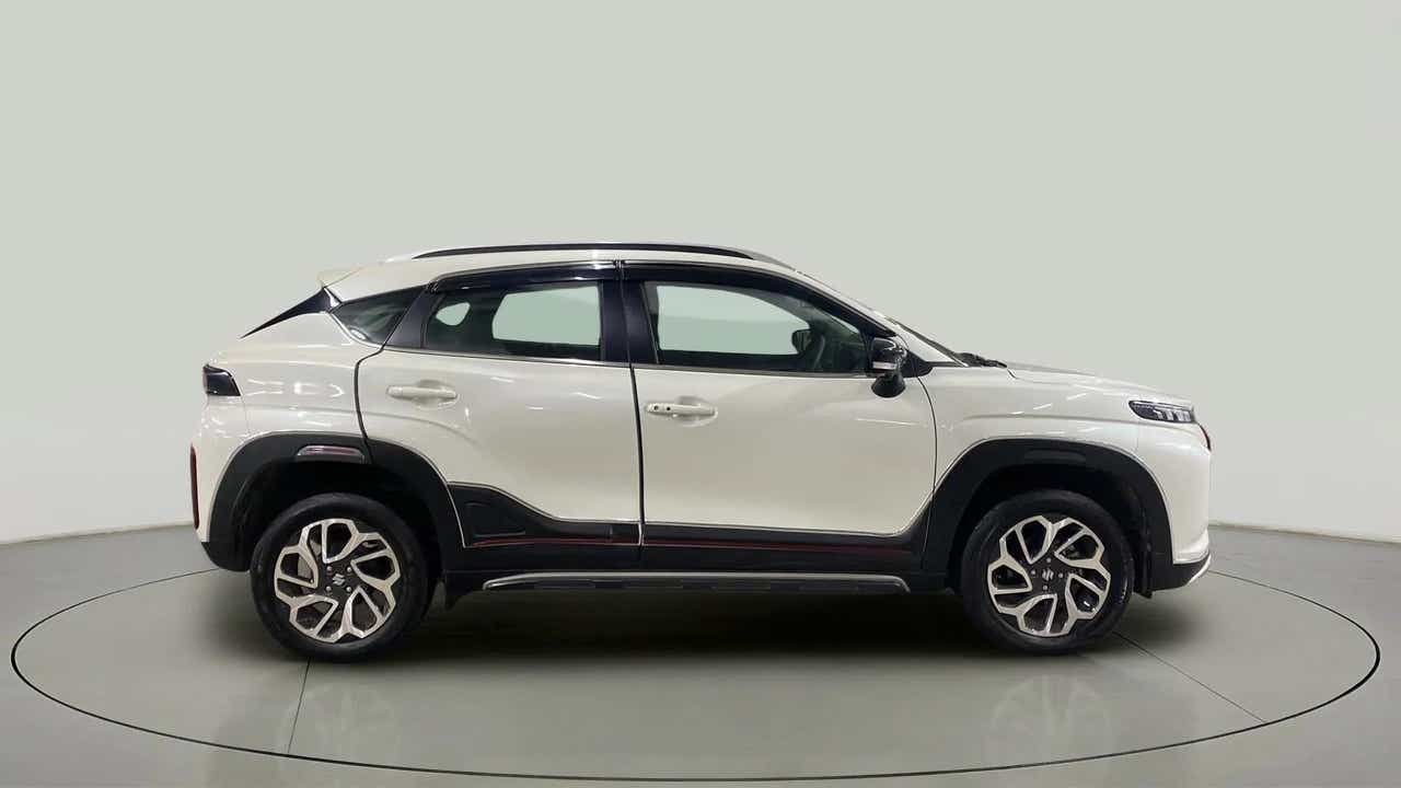 Side view of a Maruti Suzuki FRONX