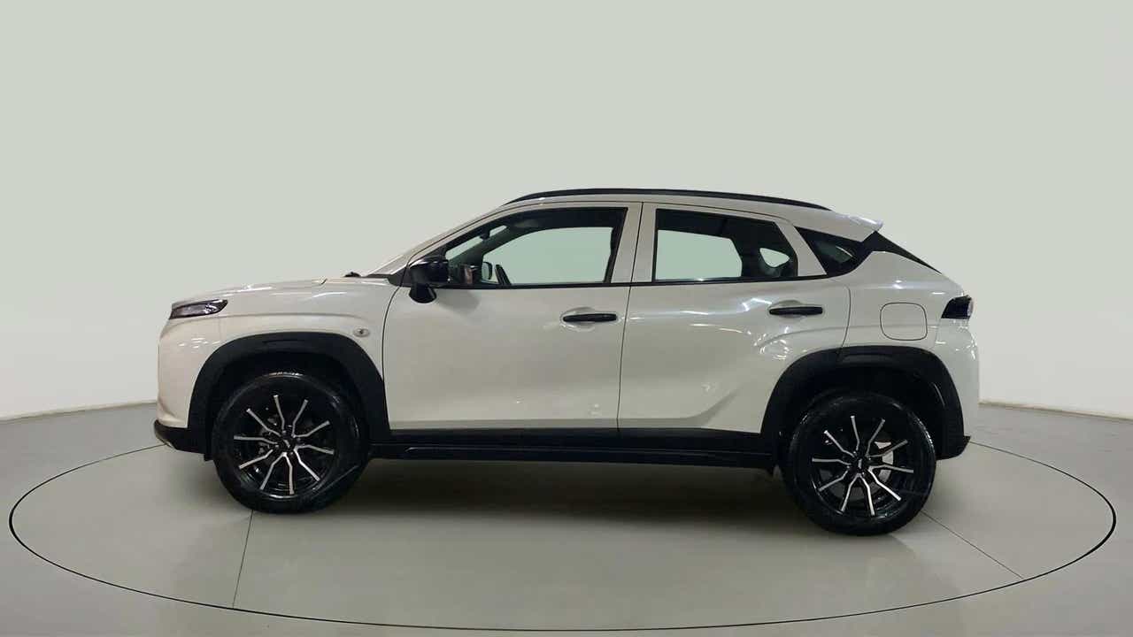 Side view of a Maruti Suzuki FRONX