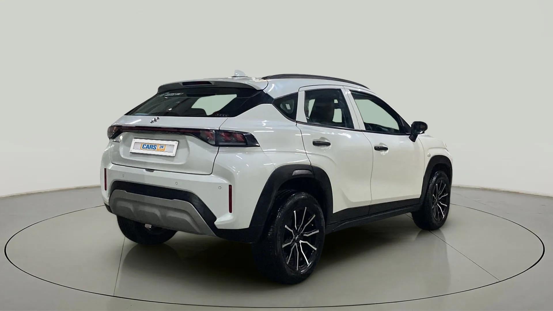 Rear three-quarter view of a Maruti Suzuki FRONX