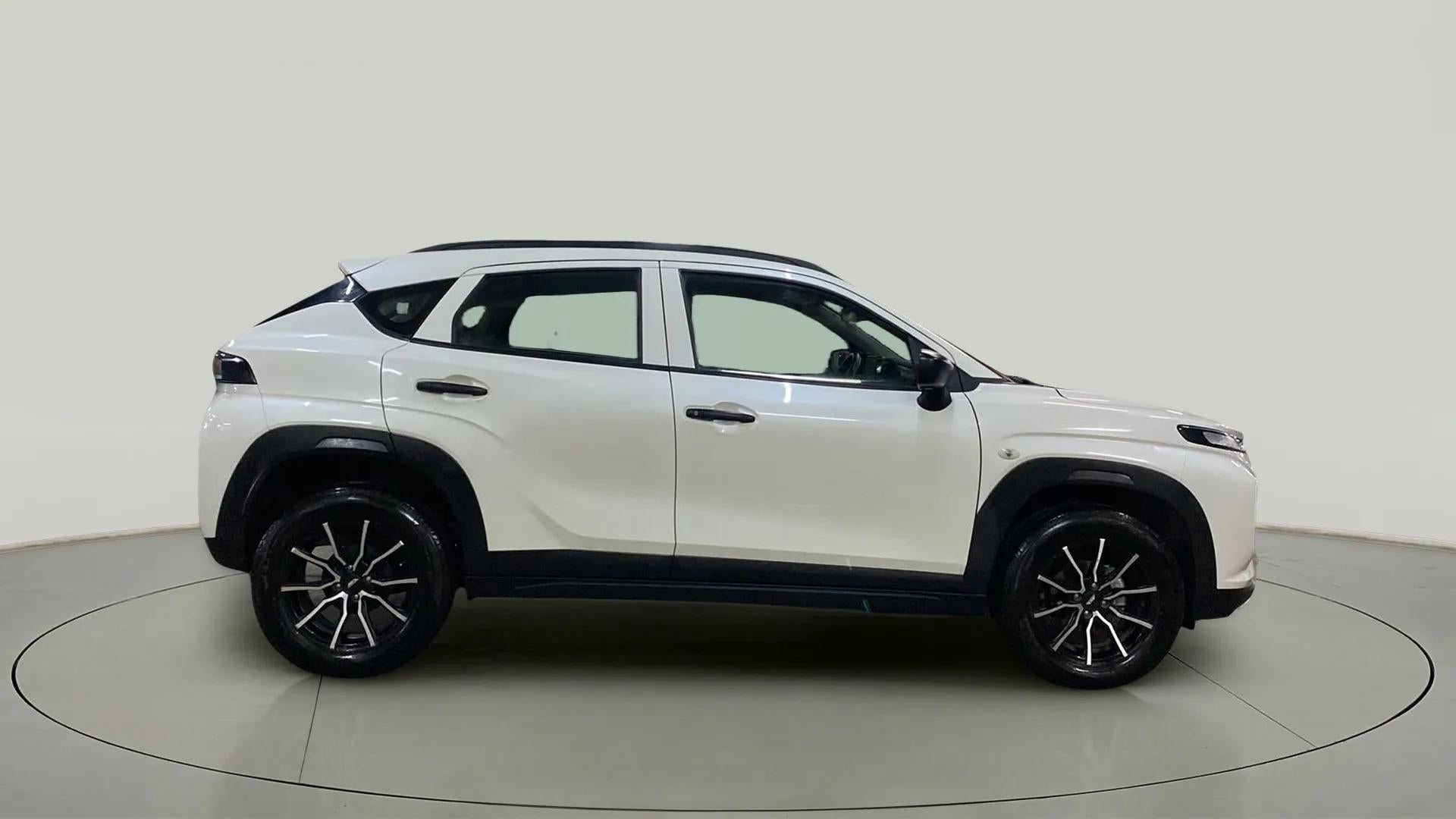 Side view of a Maruti Suzuki FRONX