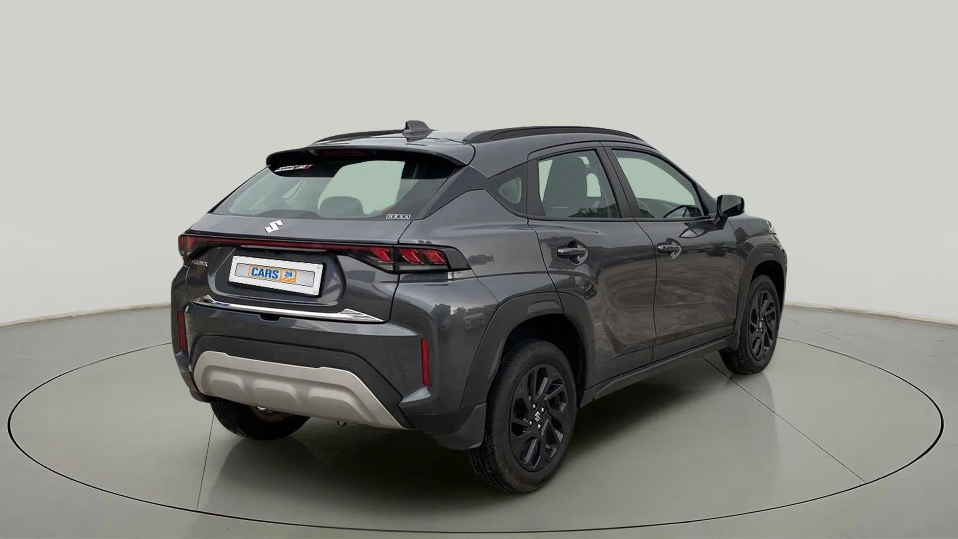 Rear three-quarter view of a Maruti Suzuki FRONX