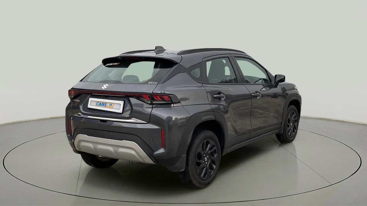 Rear three-quarter view of a Maruti Suzuki FRONX
