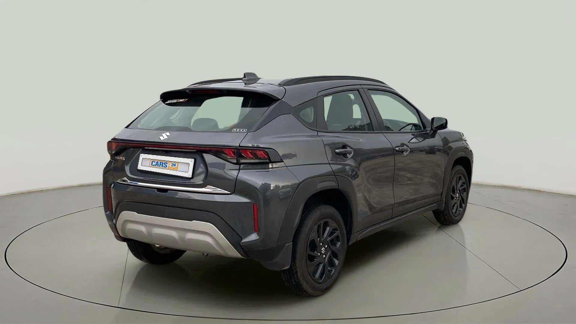 Rear three-quarter view of a Maruti Suzuki FRONX