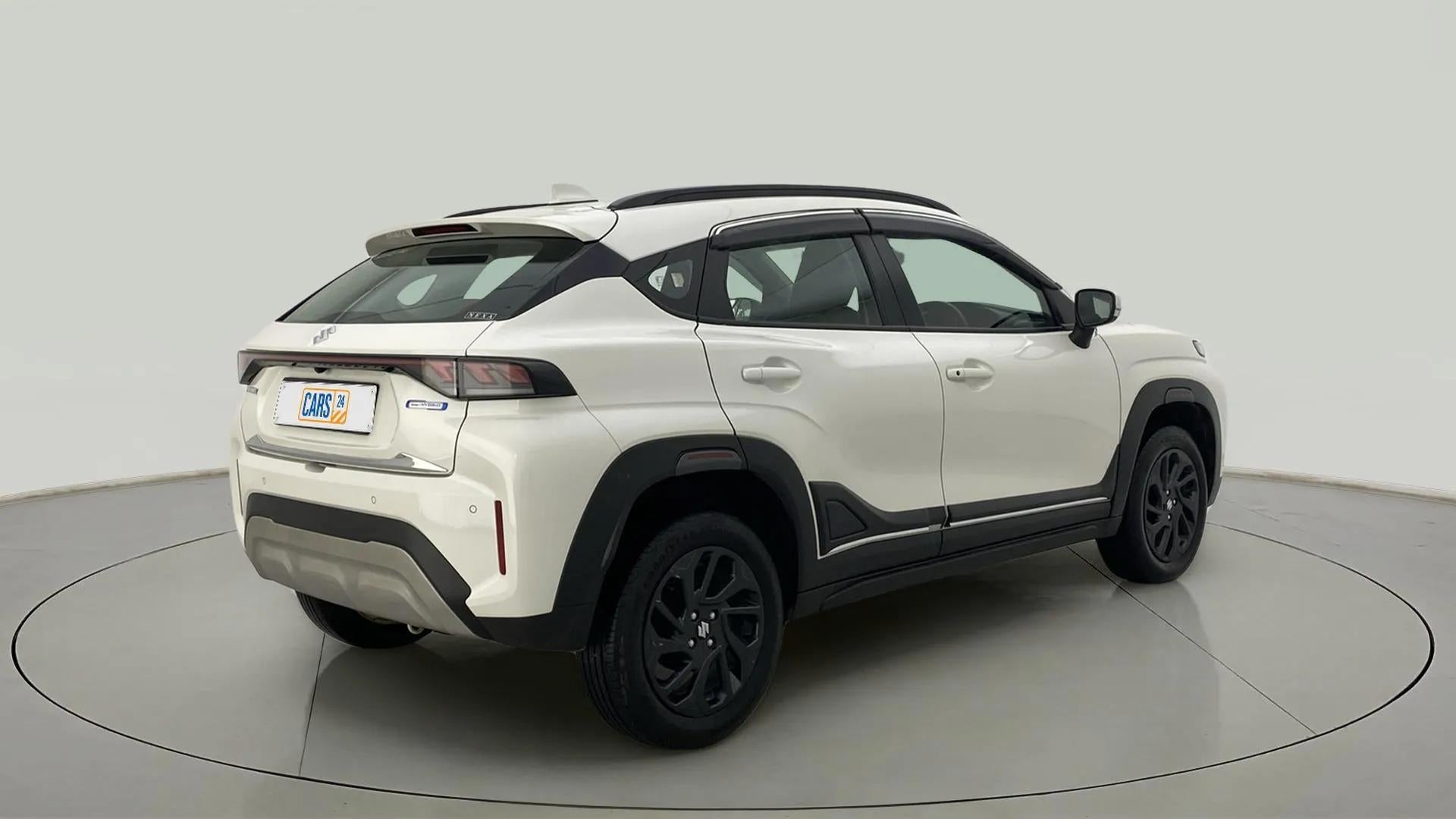 Rear three-quarter view of a Maruti Suzuki FRONX