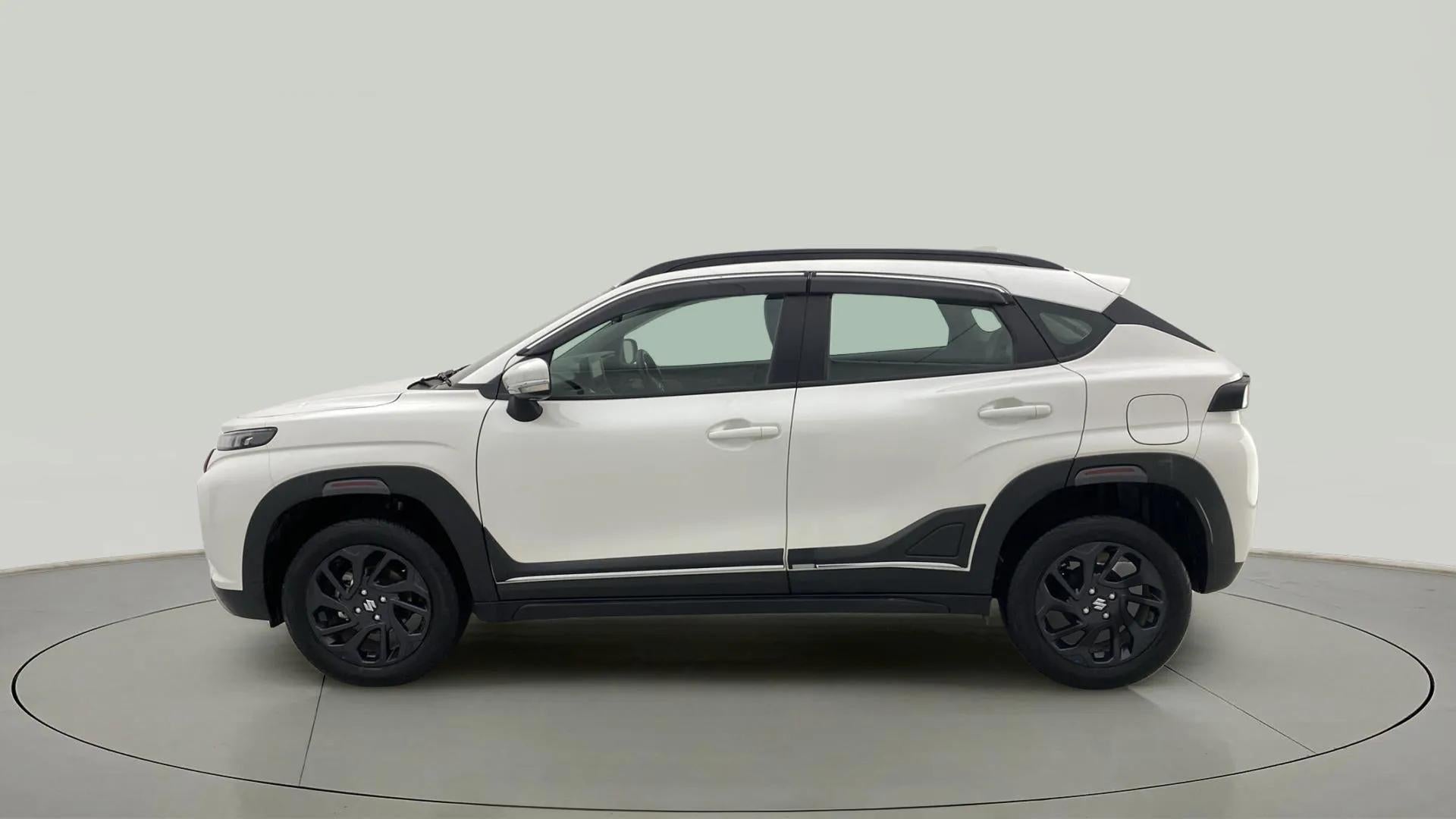 Side view of a Maruti Suzuki FRONX