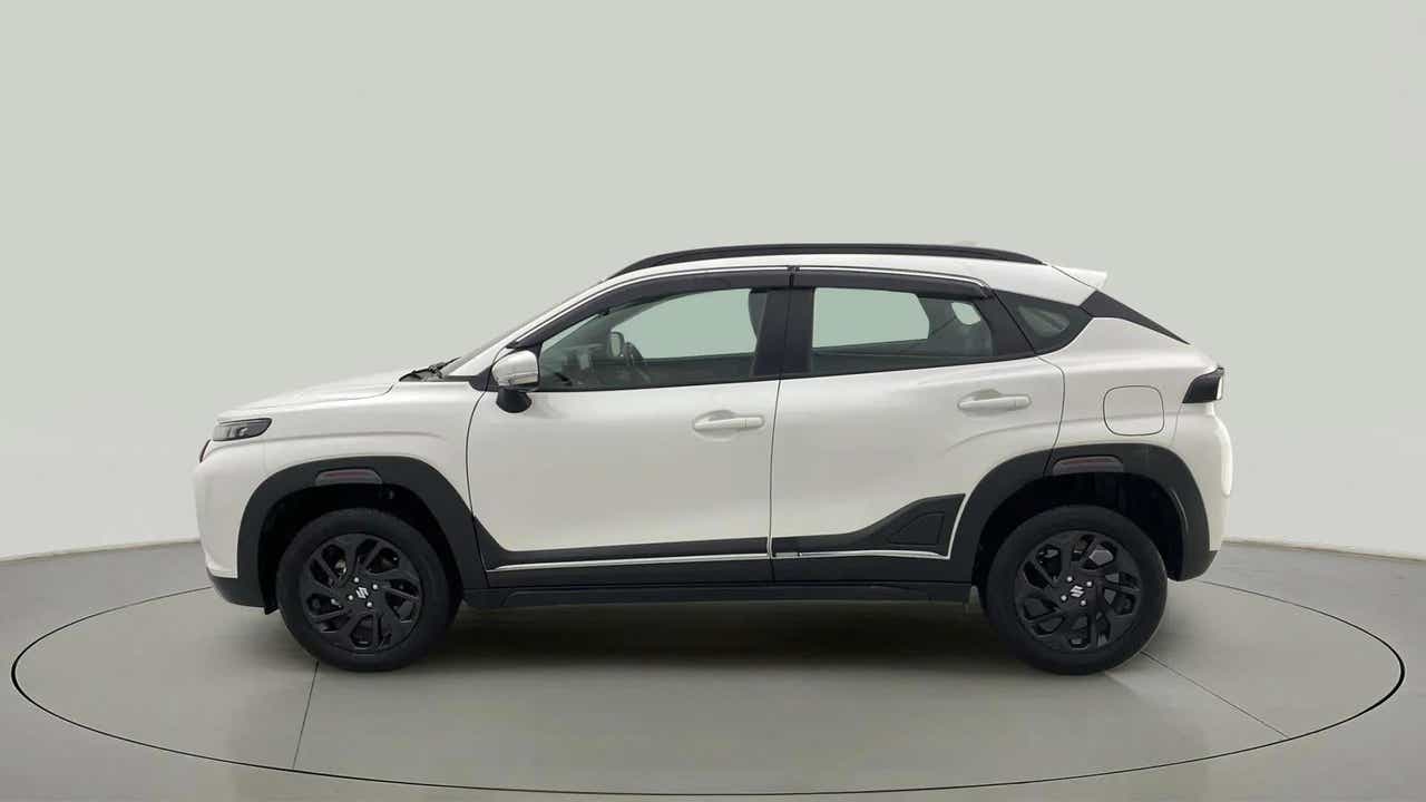 Side view of a Maruti Suzuki FRONX