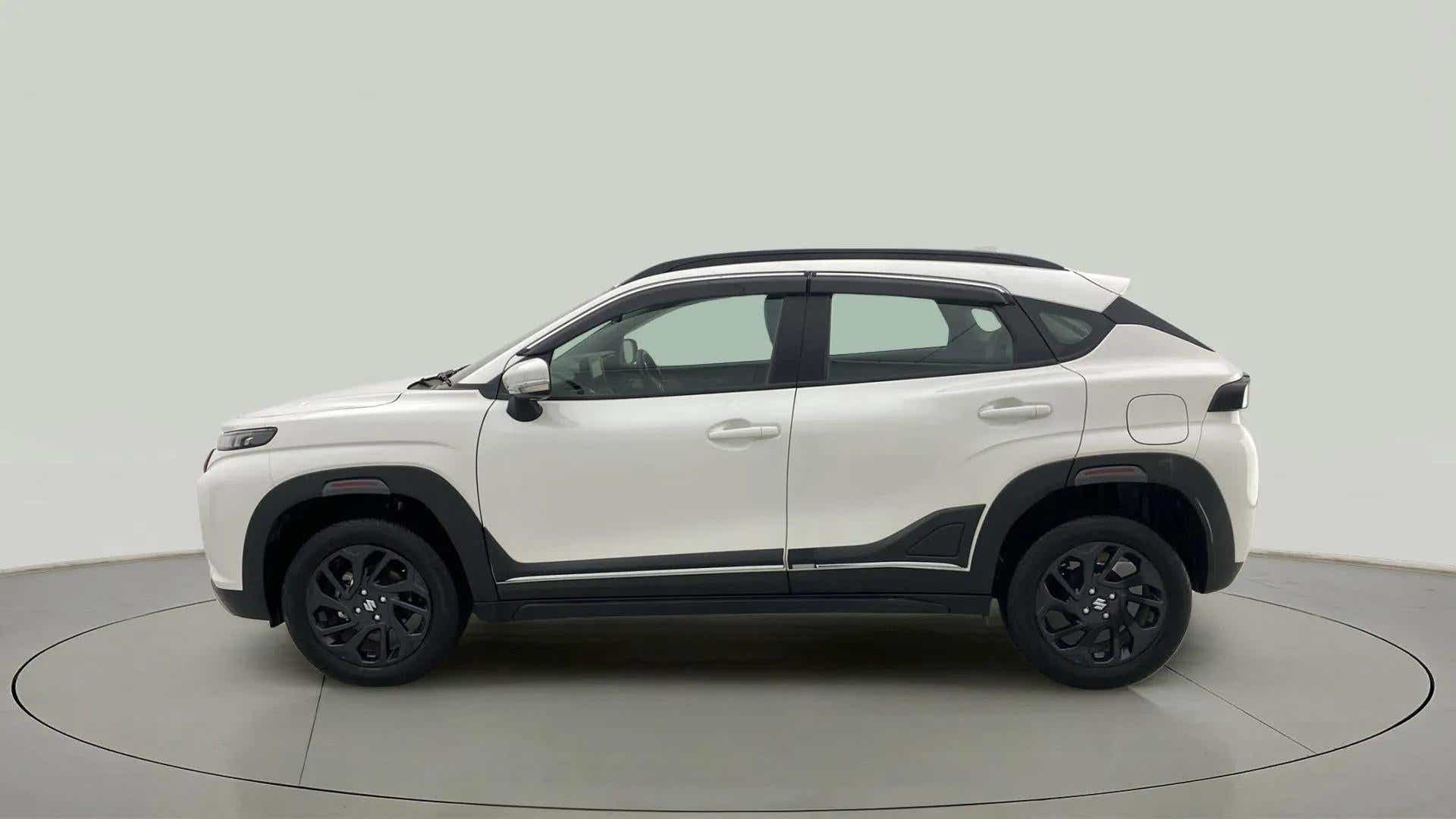 Side view of a Maruti Suzuki FRONX