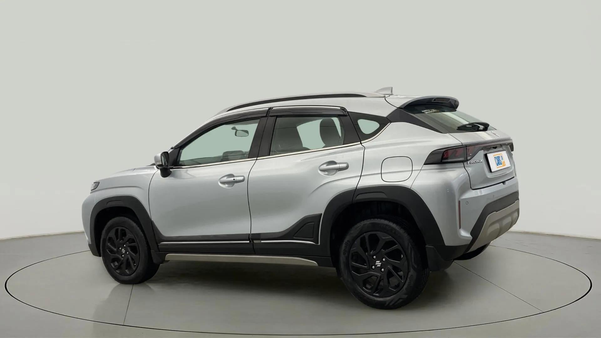 Rear three quarter of a Maruti Suzuki FRONX