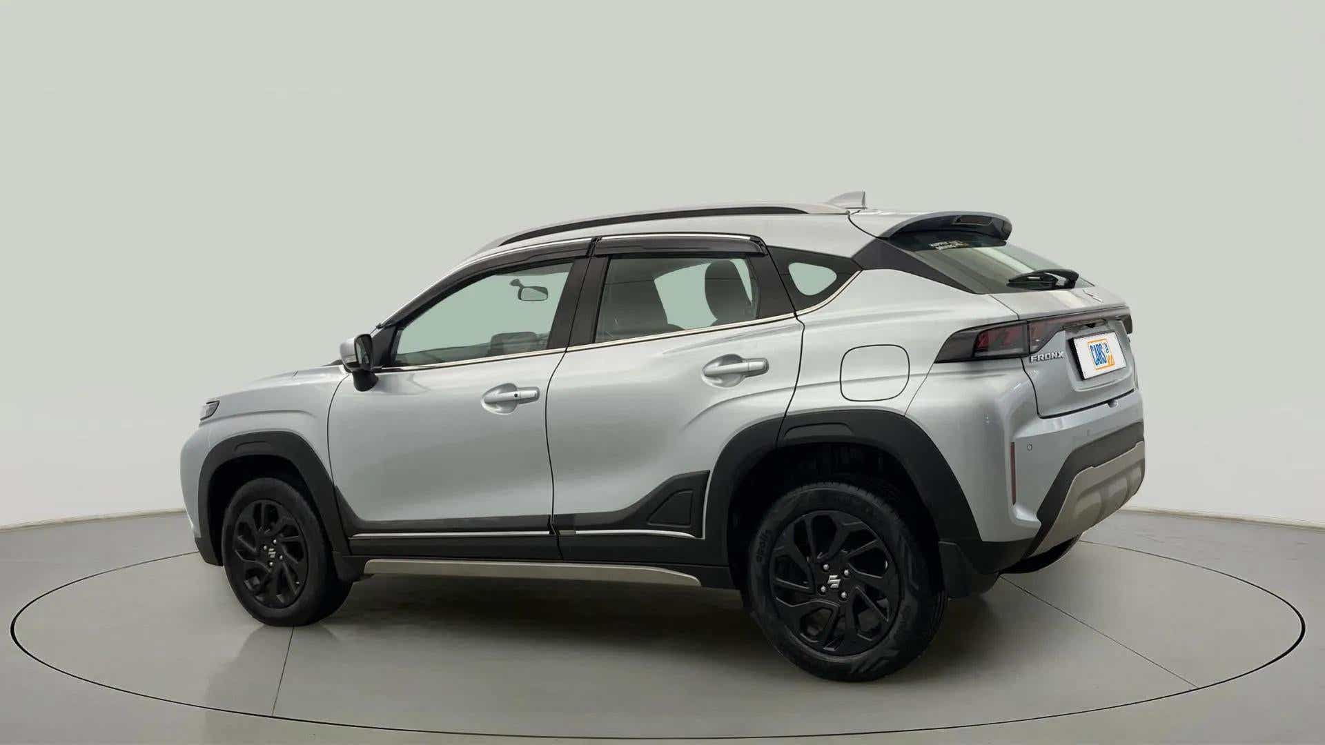 Rear three quarter of a Maruti Suzuki FRONX
