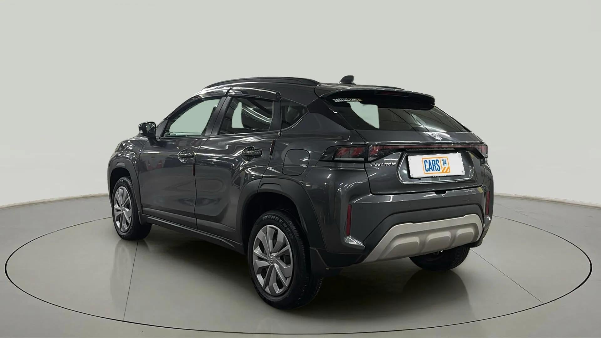 Rear three-quarter view of a Maruti Suzuki FRONX