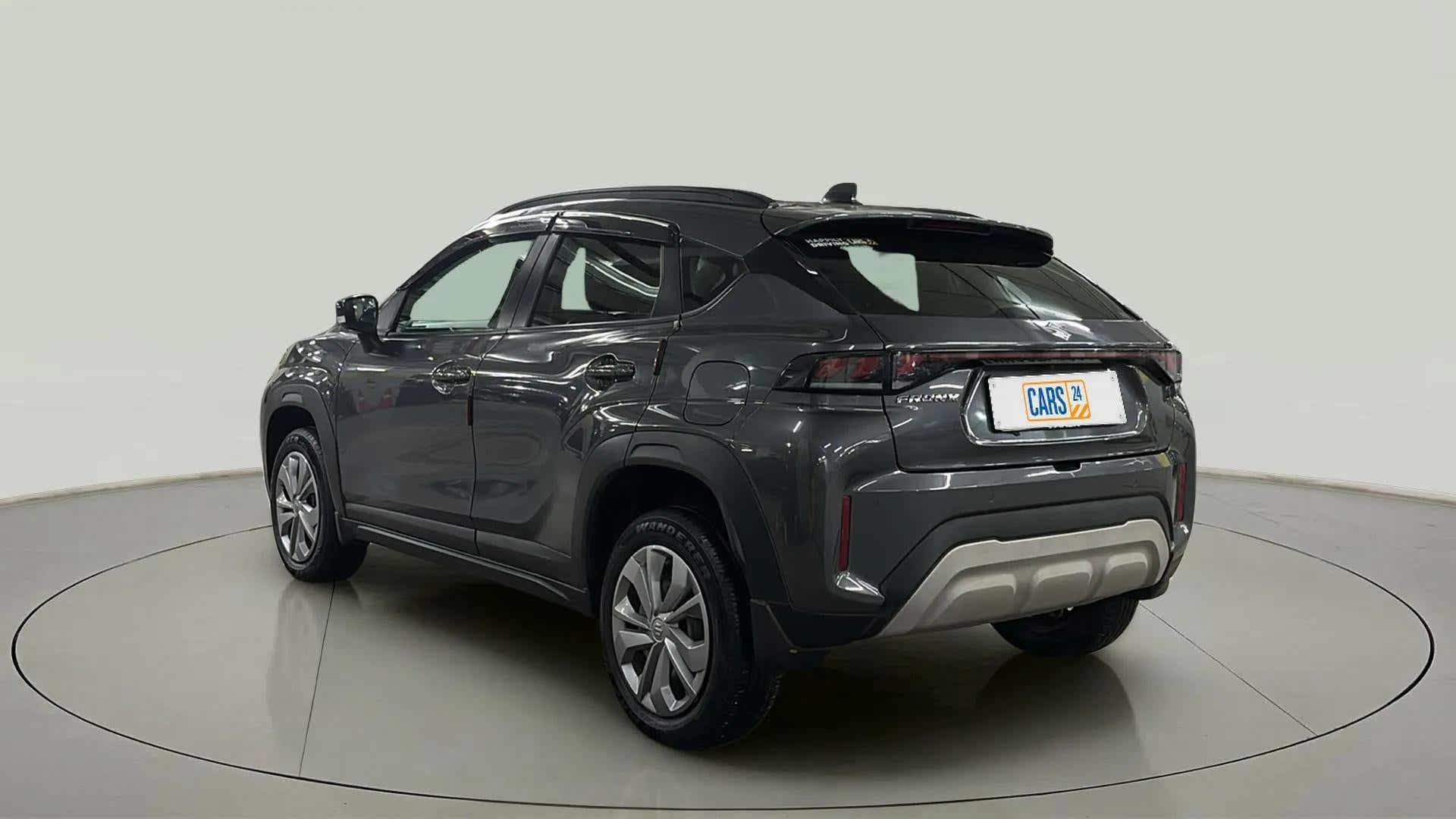 Rear three-quarter view of a Maruti Suzuki FRONX