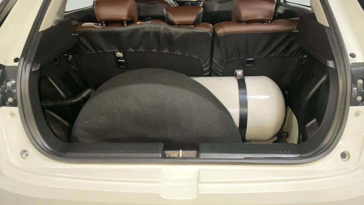 Boot space and rear seat view of a Maruti Suzuki FRONX
