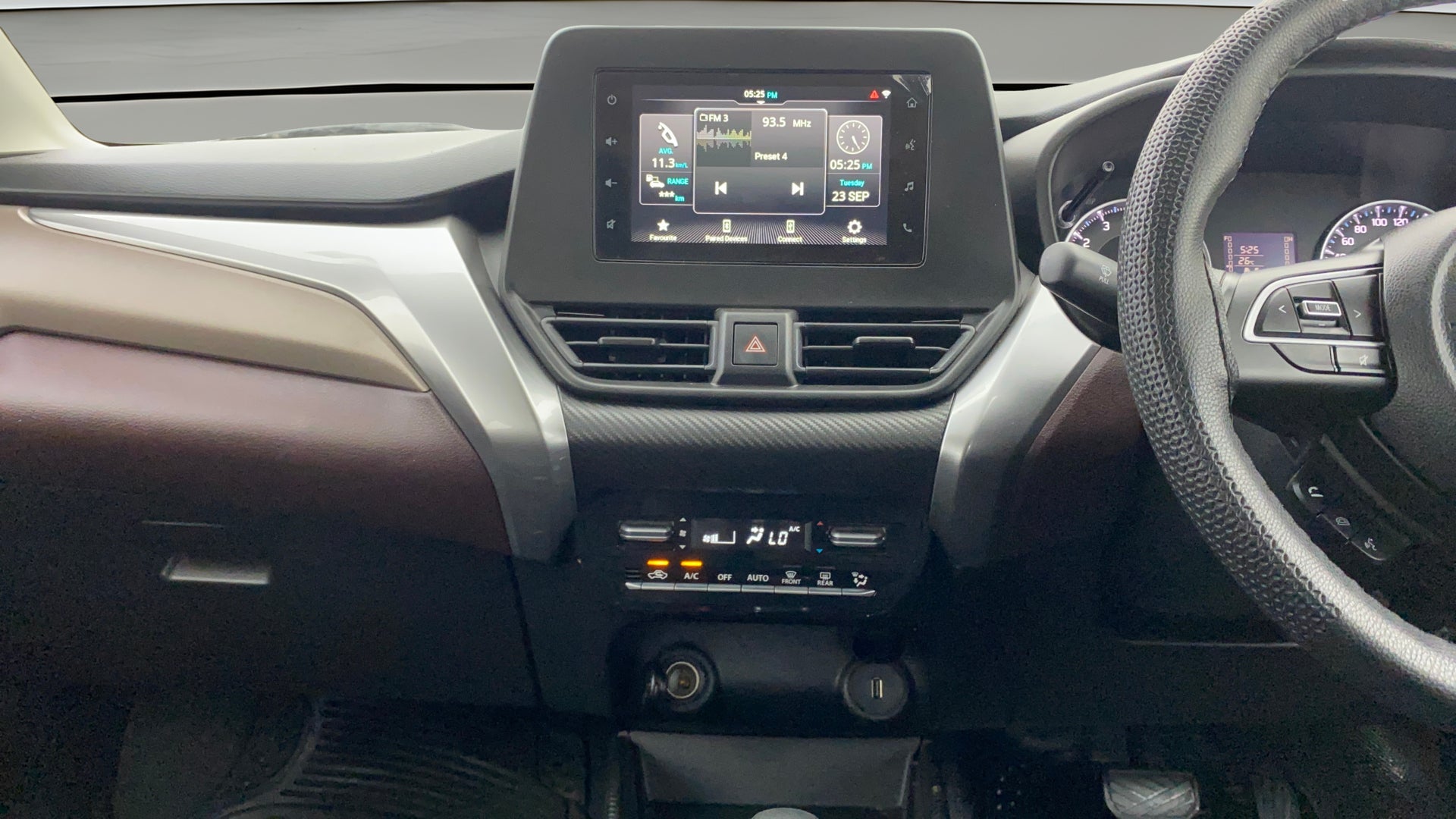 Dashboard and infotainment system of a Maruti Suzuki FRONX