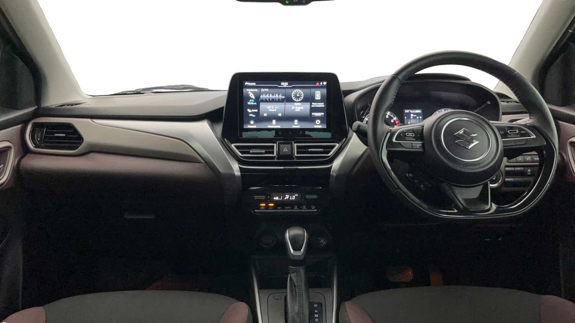 Dashboard and steering wheel of a Maruti Suzuki FRONX
