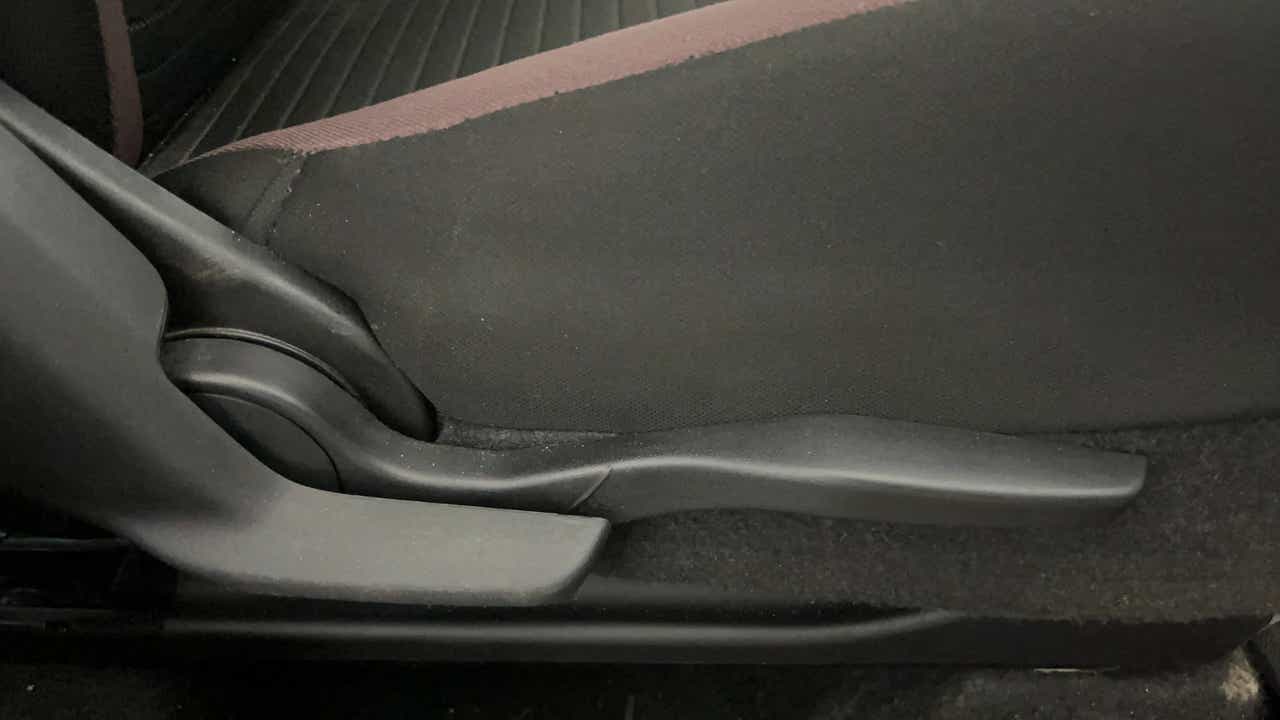 Side view of a Maruti Suzuki FRONX front seat adjustment lever