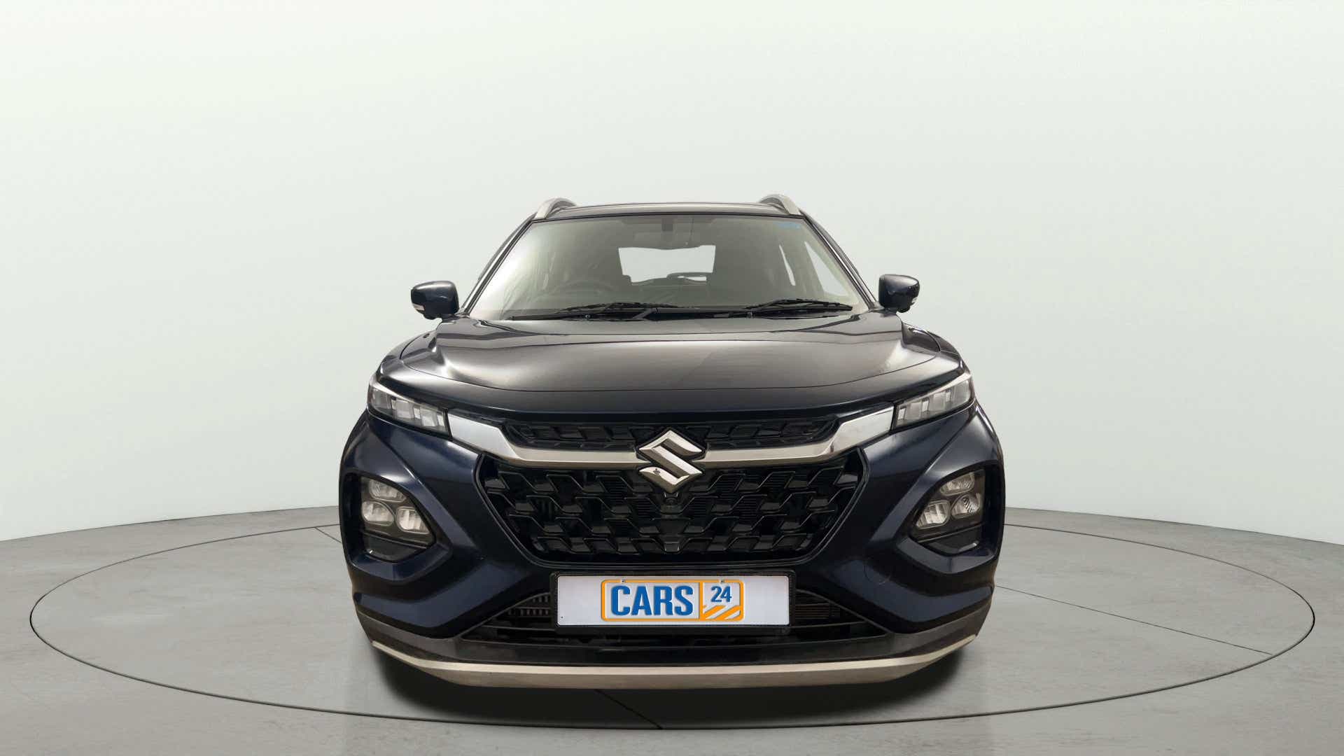 Front view of a Nexa Blue Maruti Suzuki FRONX