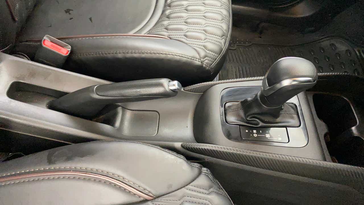 Automatic gear lever and handbrake of a Maruti Suzuki FRONX