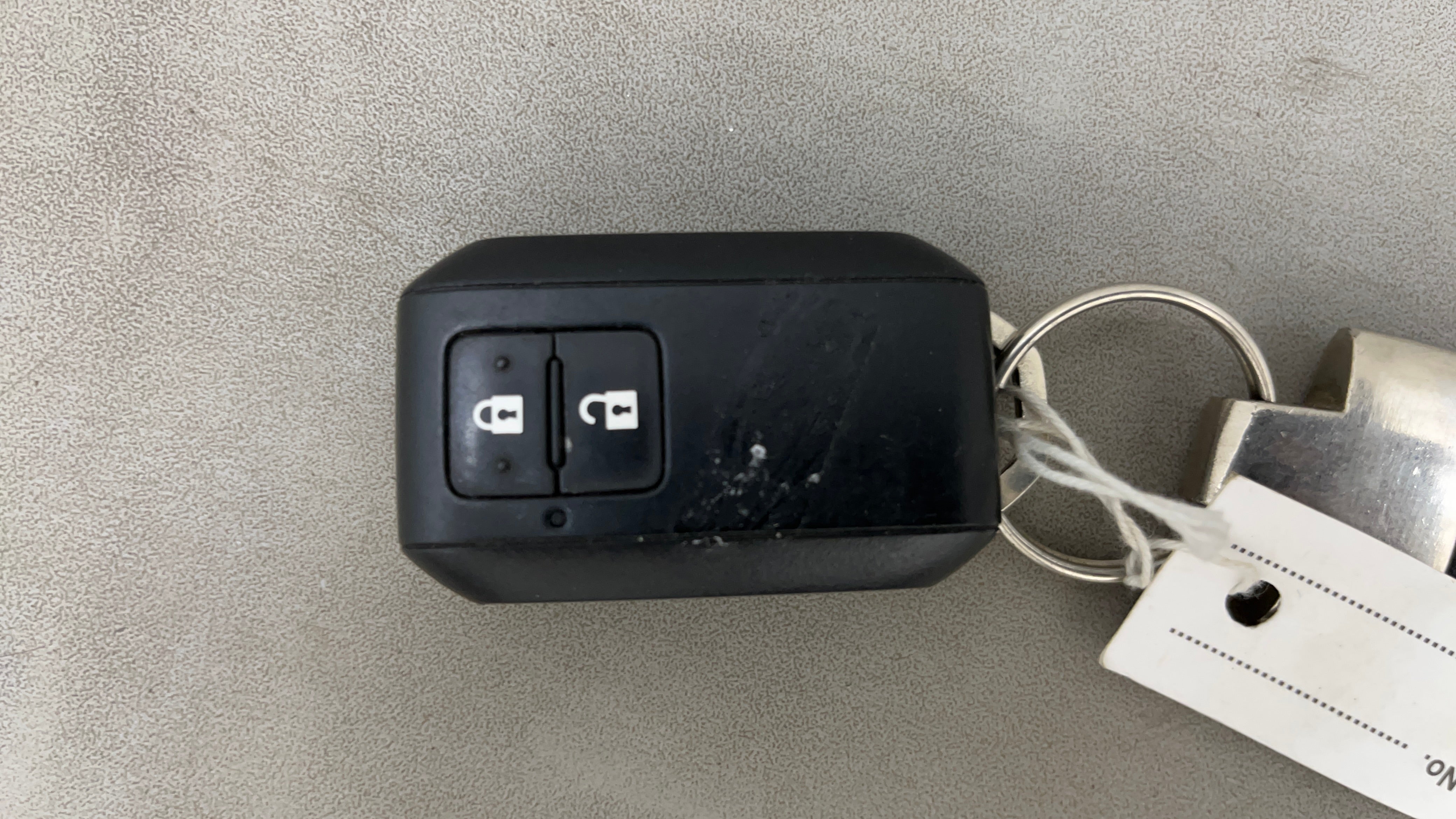 Close-up of a Maruti Suzuki FRONX key fob