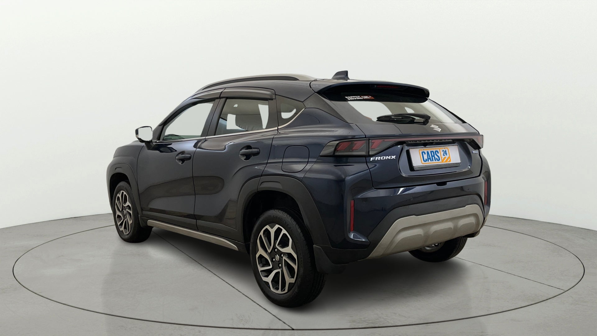 Rear three-quarter view of a Maruti Suzuki FRONX