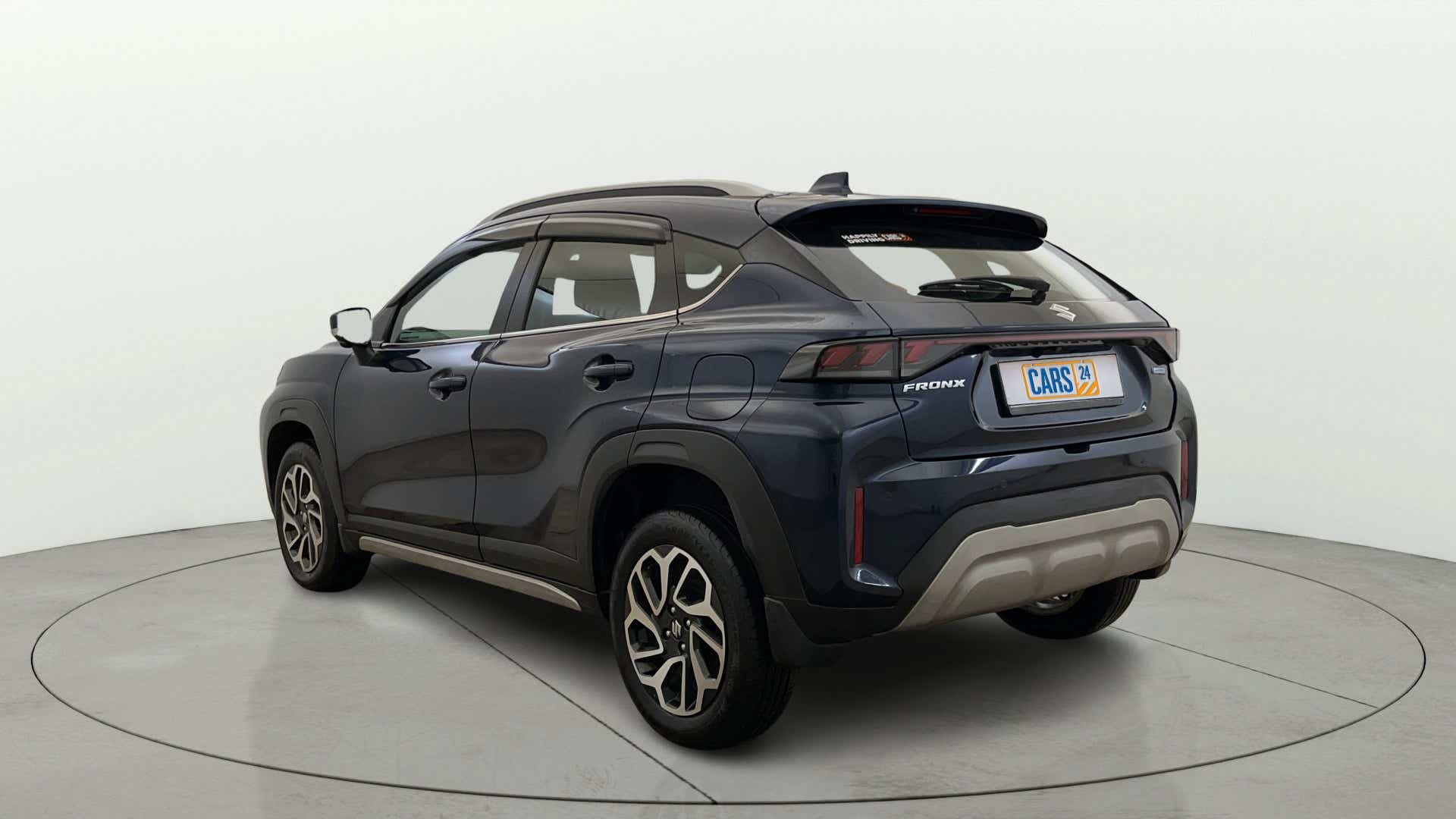 Rear three-quarter view of a Maruti Suzuki FRONX