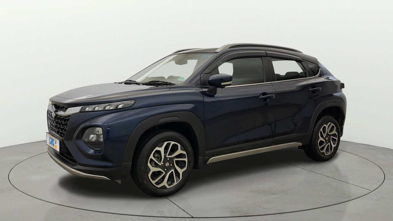 Front three-quarter view of a Nexa Blue Maruti Suzuki FRONX