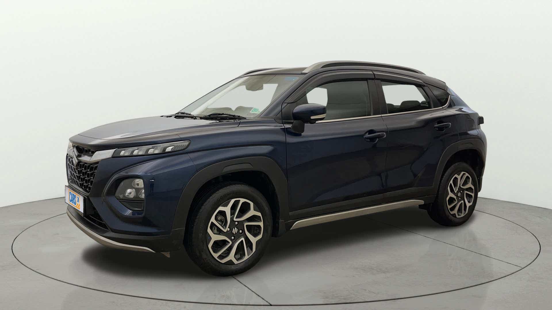 Front three-quarter view of a Nexa Blue Maruti Suzuki FRONX