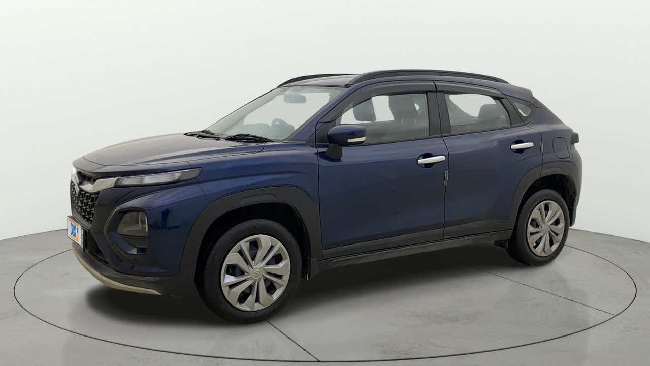 Front three-quarter view of a nexa blue Maruti Suzuki FRONX