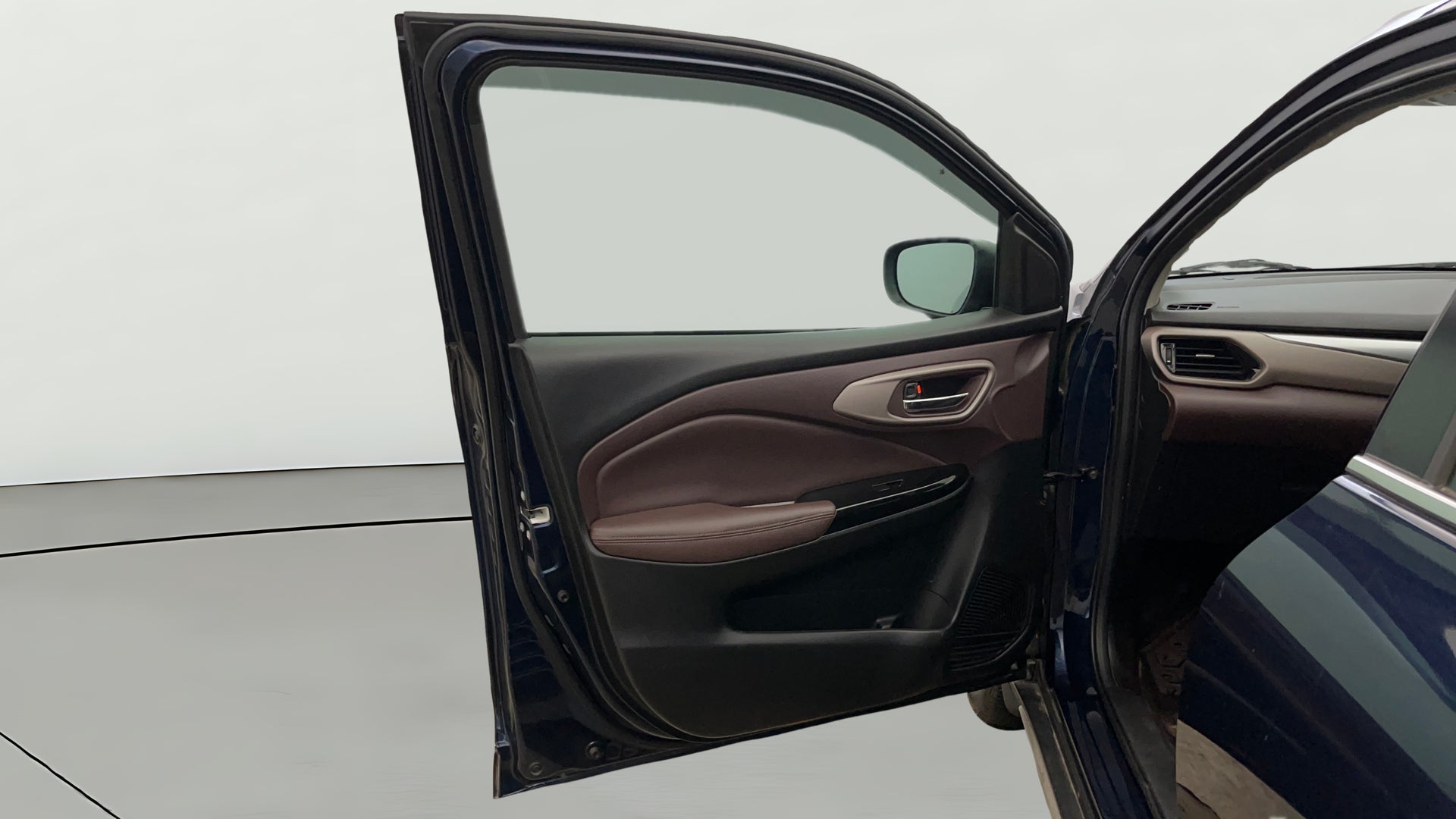 Front driver side door interior of a Maruti Suzuki FRONX