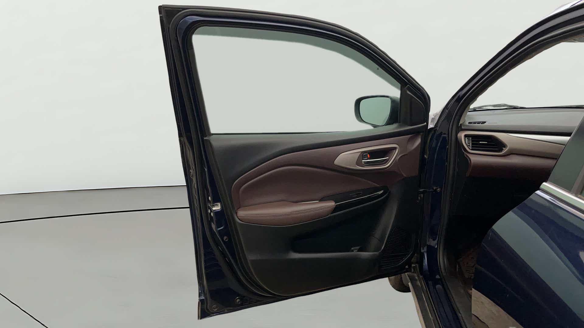 Front driver side door interior of a Maruti Suzuki FRONX