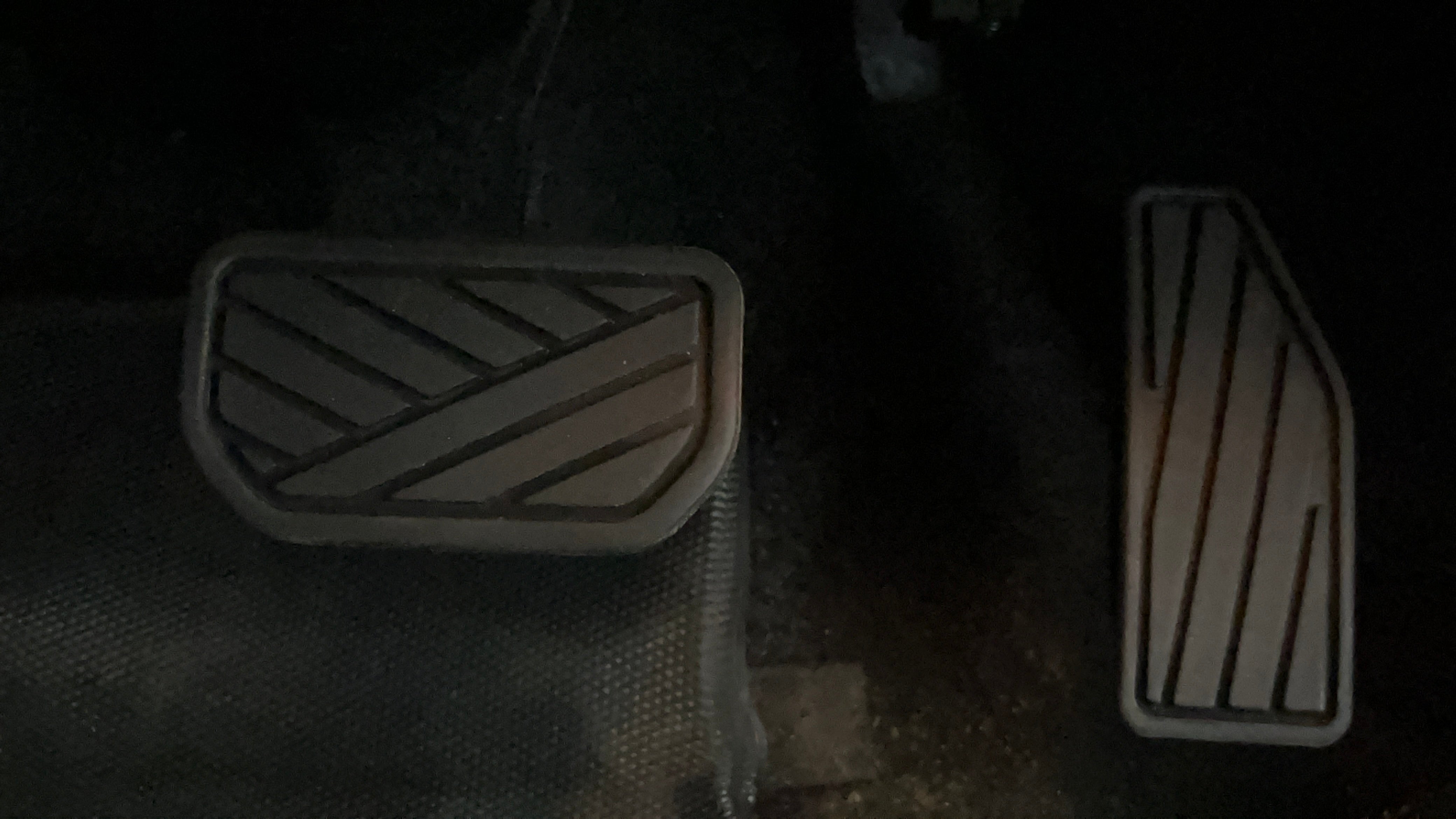 Close-up view of pedals in a Maruti Suzuki FRONX