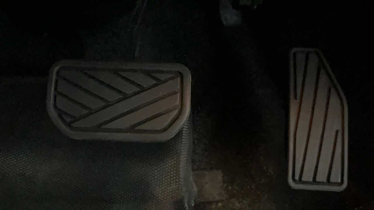 Close-up view of pedals in a Maruti Suzuki FRONX