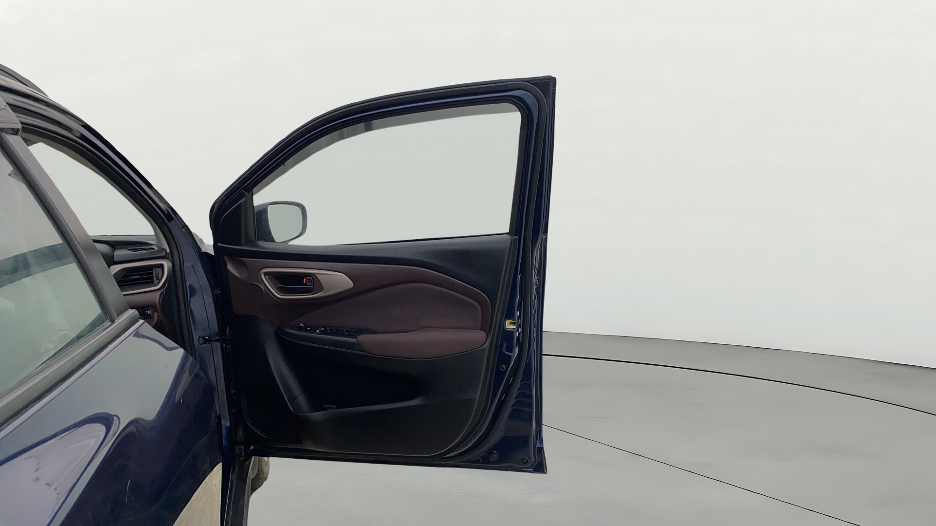 Driver side door panel of a Maruti Suzuki FRONX