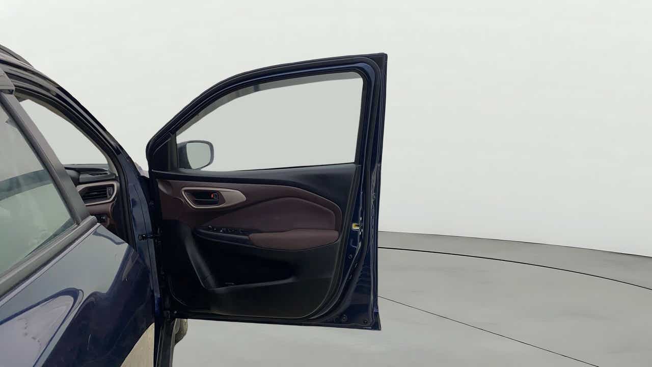 Driver side door panel of a Maruti Suzuki FRONX