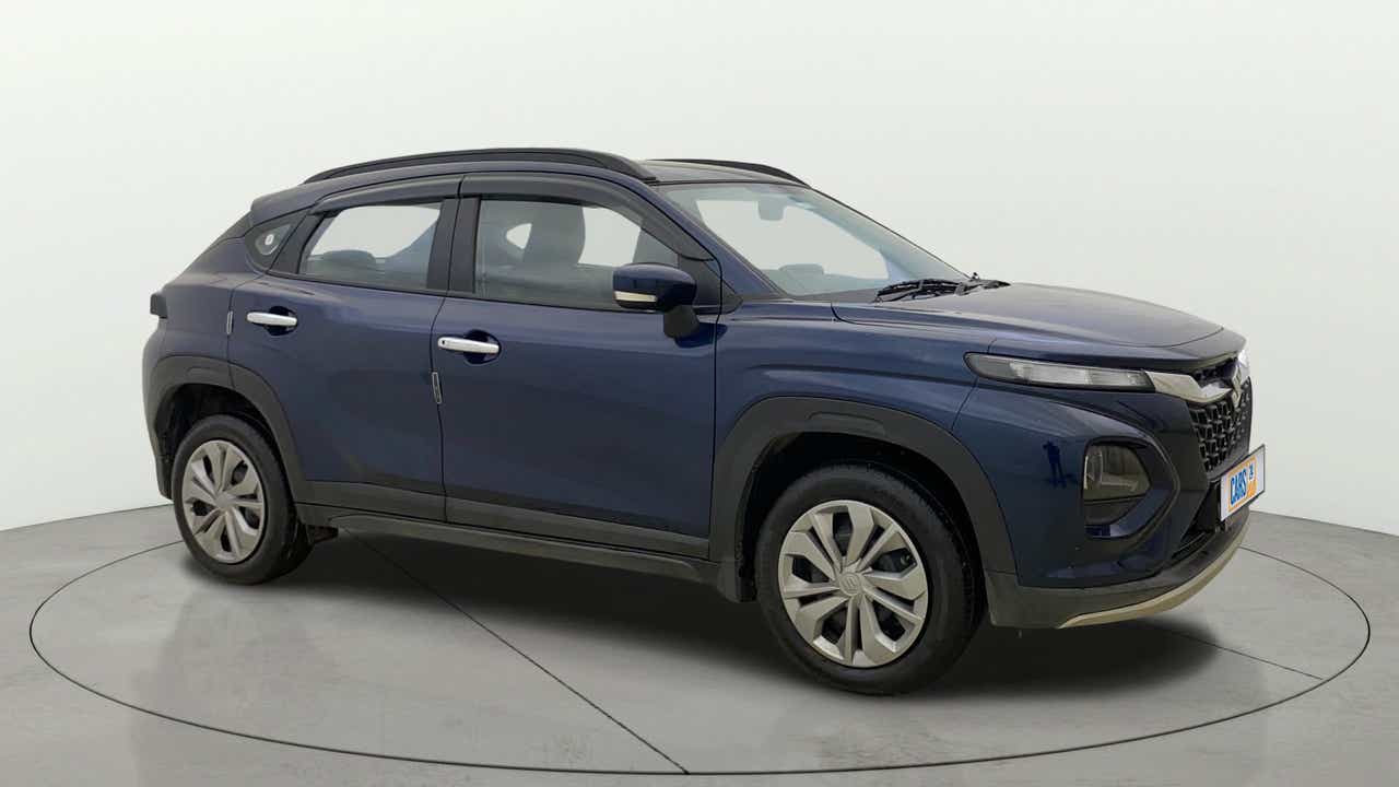 Side view of a Nexa Blue Maruti Suzuki FRONX