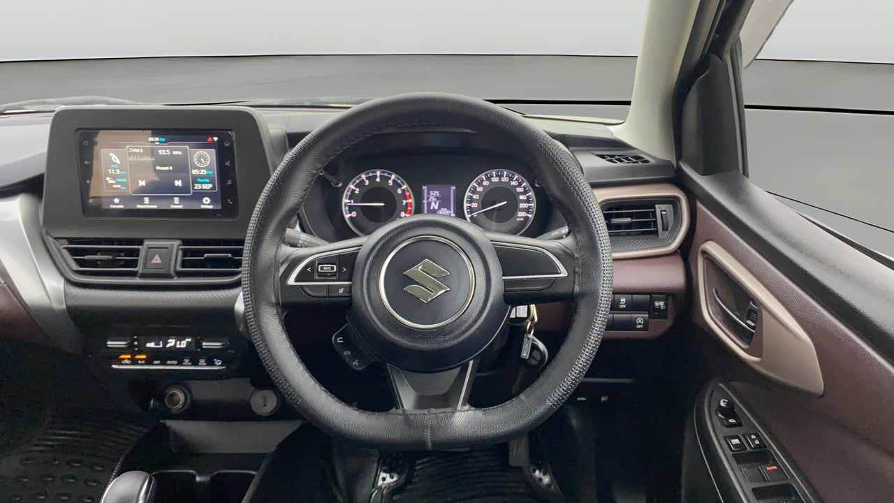Dashboard and steering wheel of a Maruti Suzuki FRONX