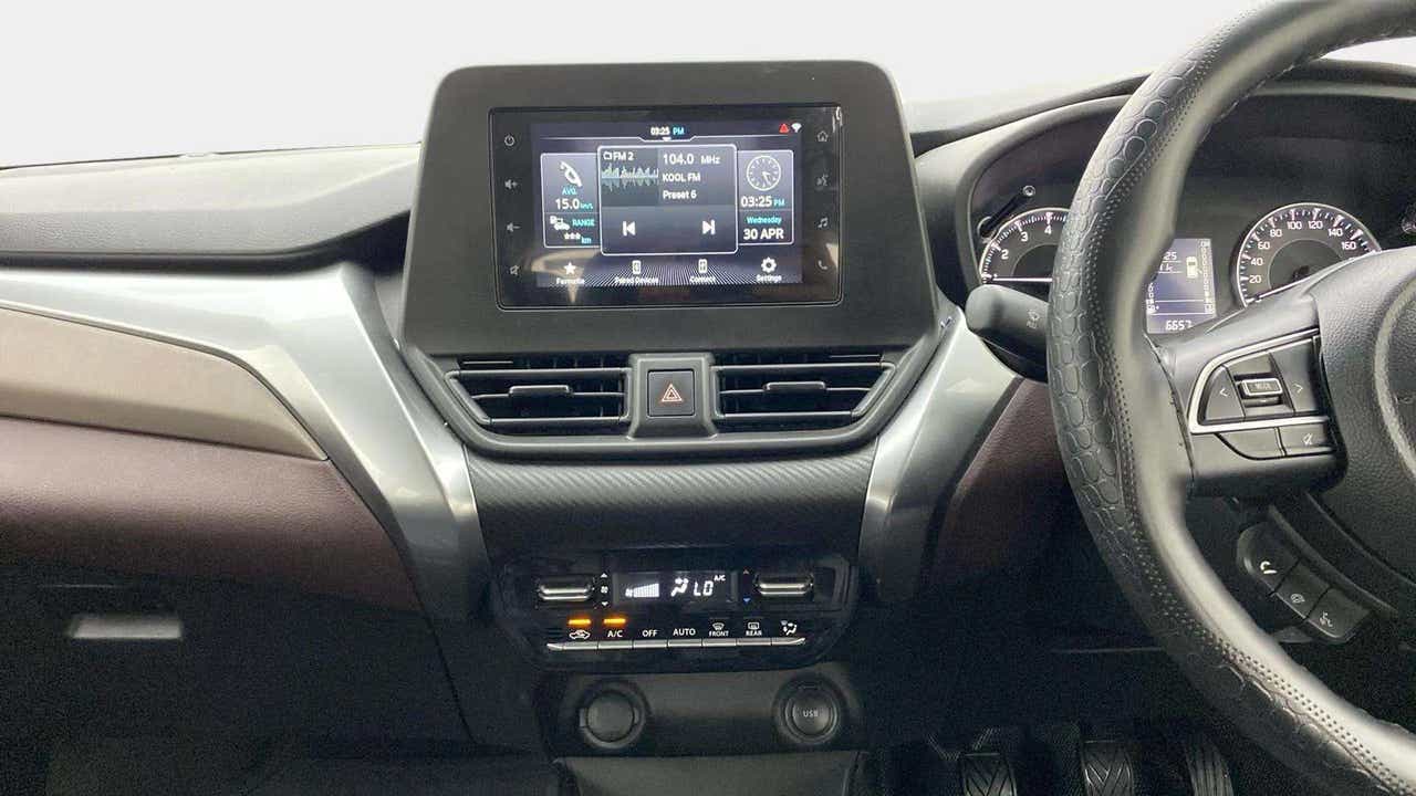 Dashboard and infotainment view of a Maruti Suzuki FRONX