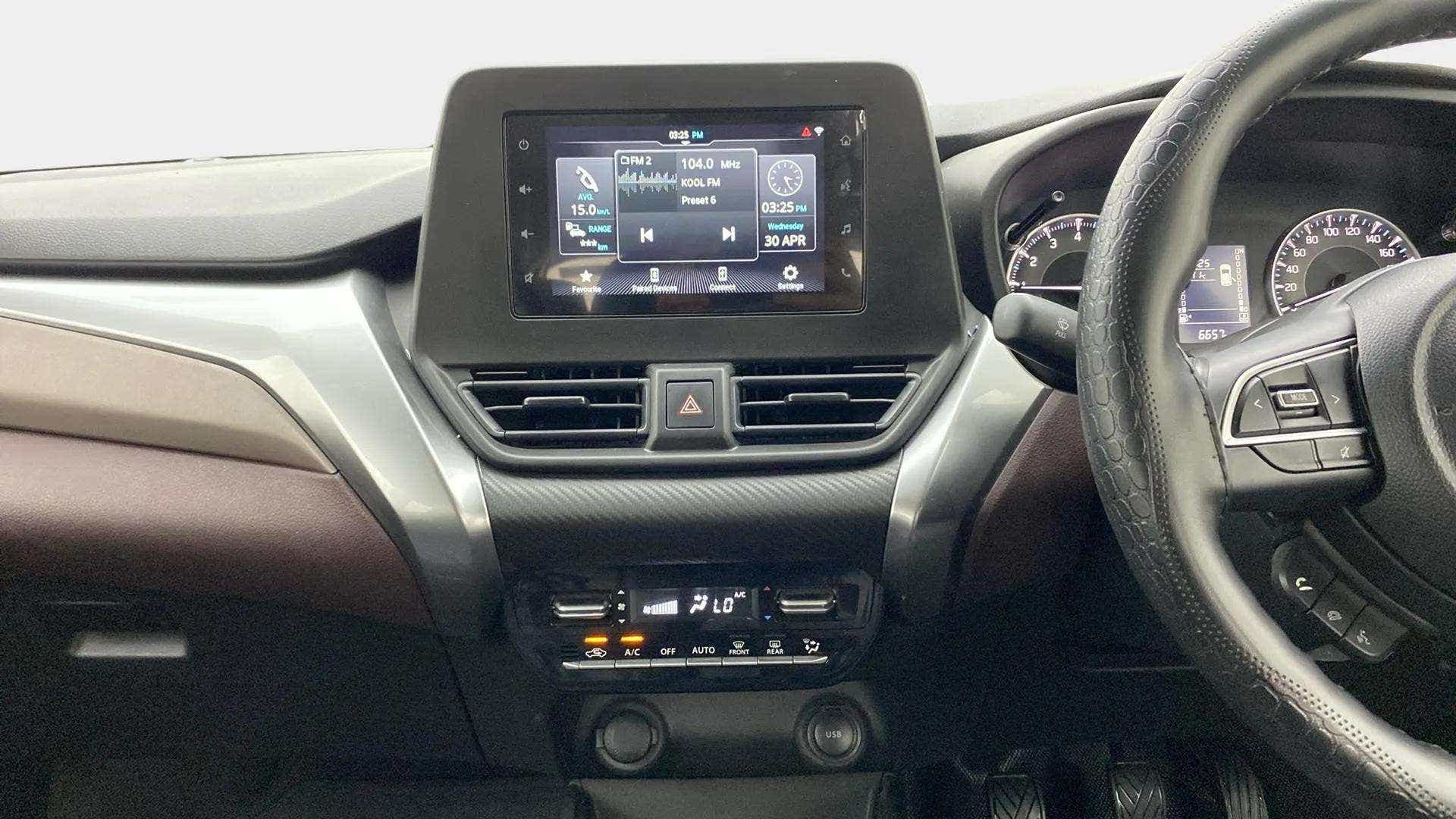 Dashboard and infotainment view of a Maruti Suzuki FRONX