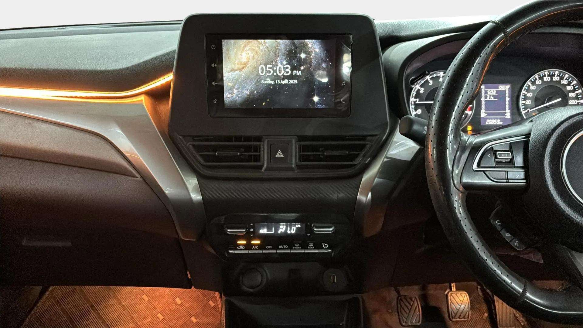 Interior dashboard view of a Maruti Suzuki FRONX