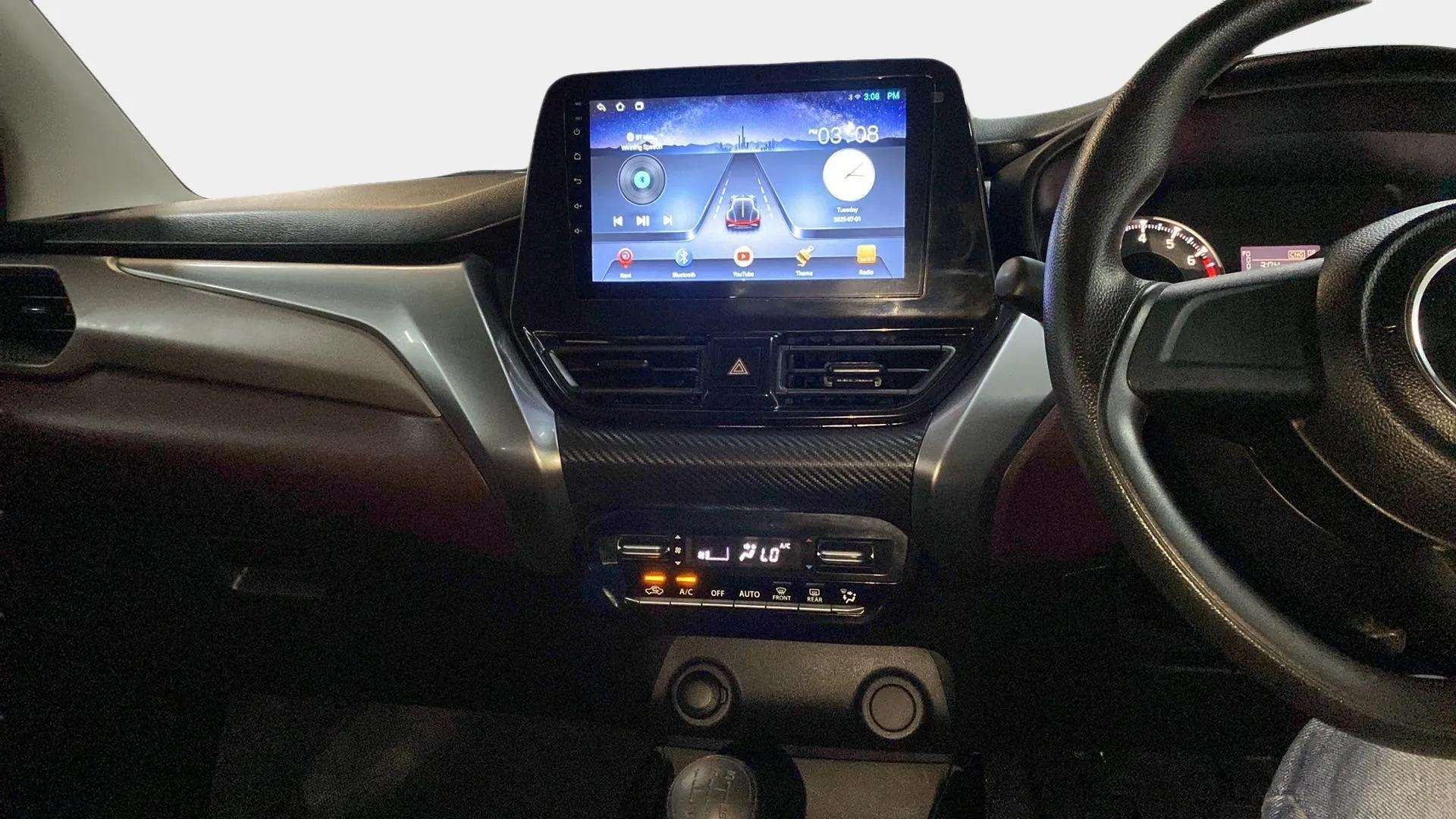 Dashboard and infotainment system of a Maruti Suzuki FRONX