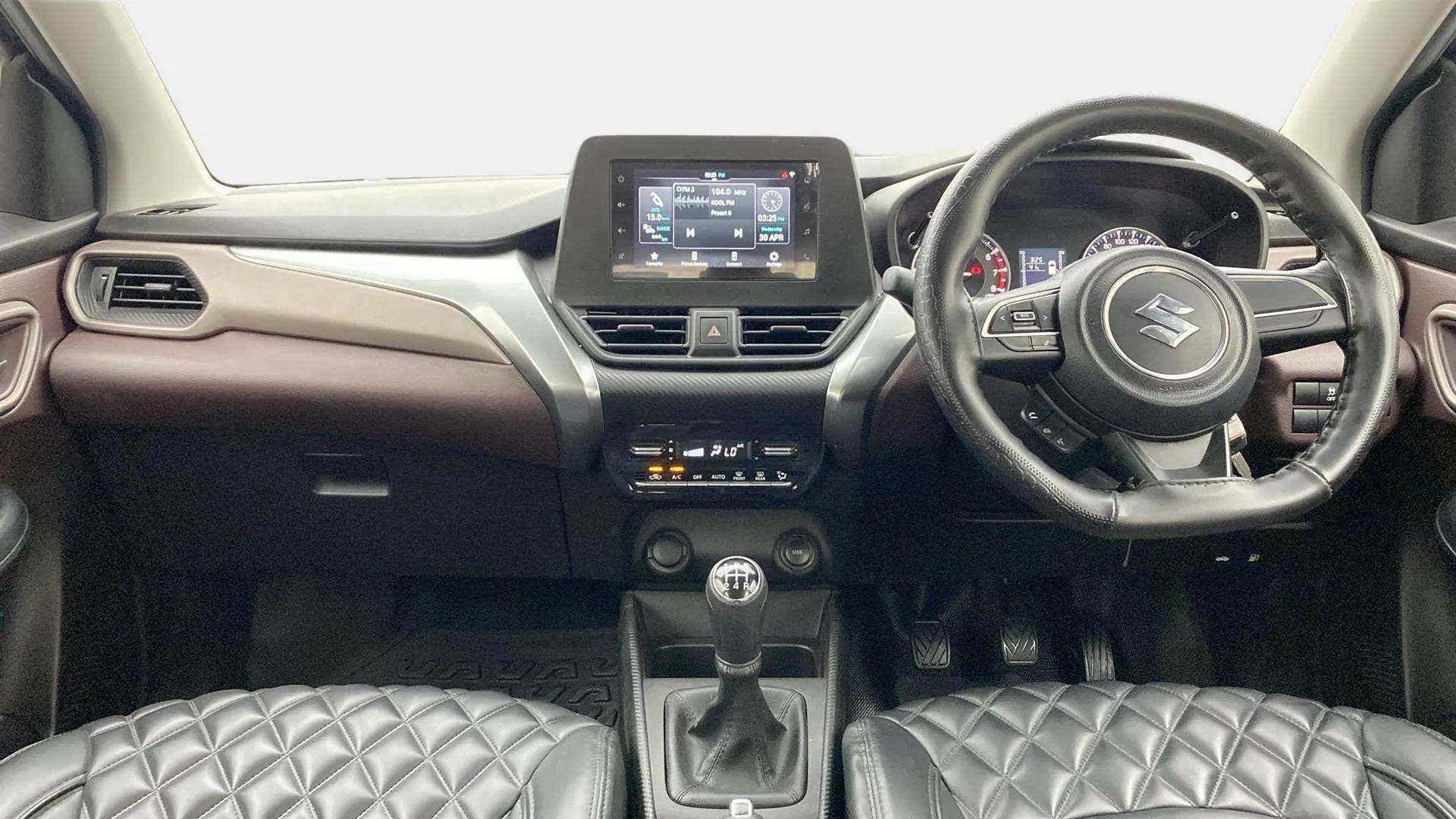 Interior dashboard view of a Maruti Suzuki FRONX