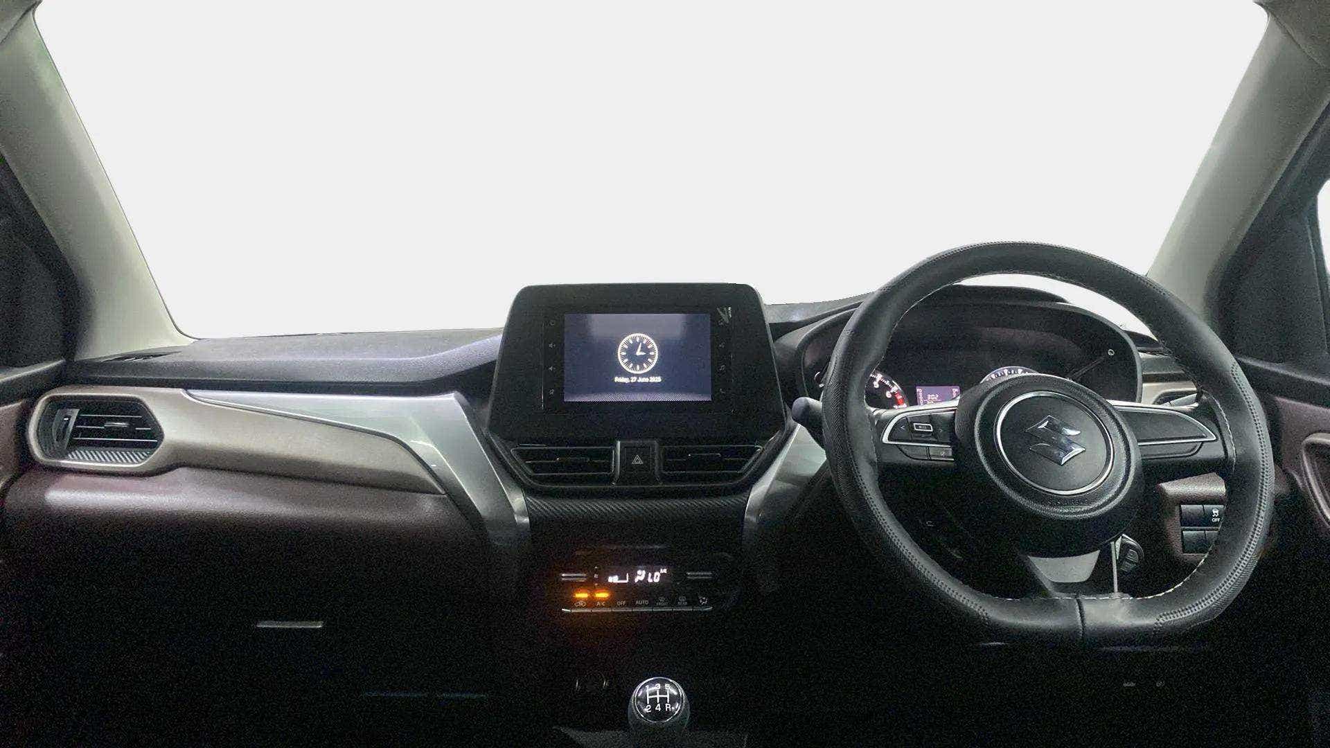Dashboard and steering wheel view of a Maruti Suzuki FRONX