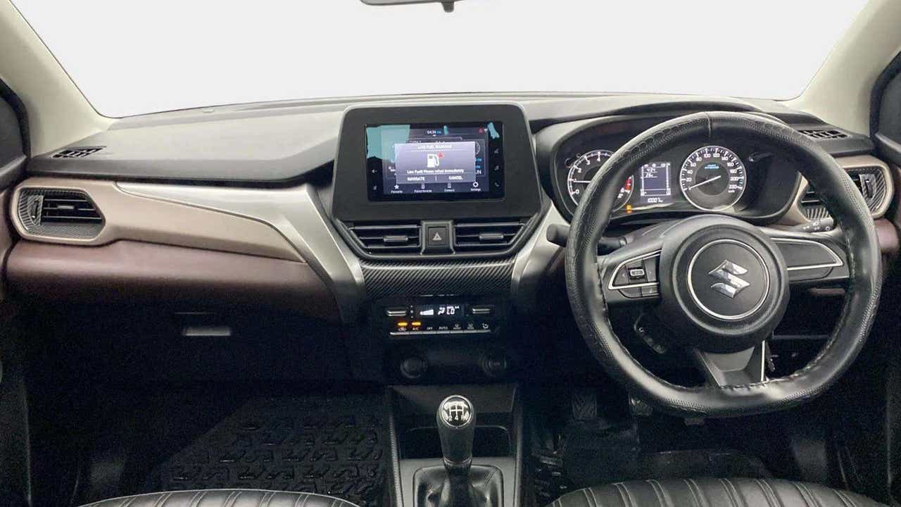 Dashboard and steering wheel of a Maruti Suzuki FRONX