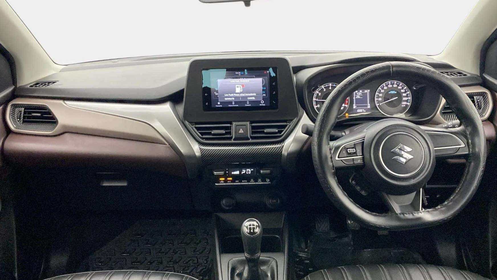 Dashboard and steering wheel of a Maruti Suzuki FRONX
