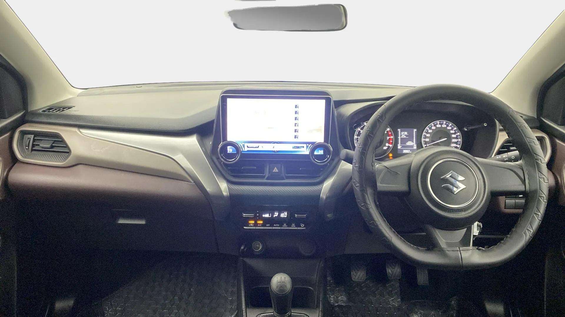 Dashboard and steering wheel of a Maruti Suzuki FRONX