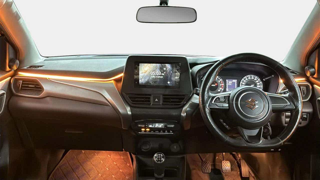 Dashboard and steering view of a Maruti Suzuki FRONX